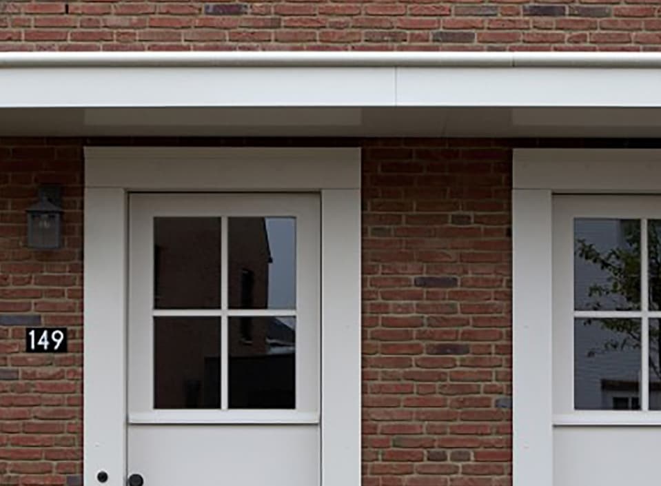 Aluminum combines with Tudor architectural style