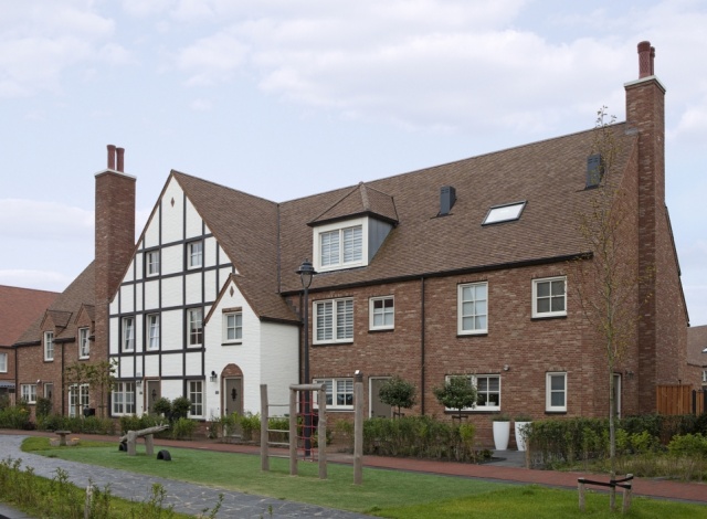 Aluminum combines with Tudor architectural style